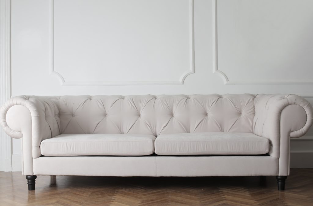 Stunning white Chesterfield sofa.